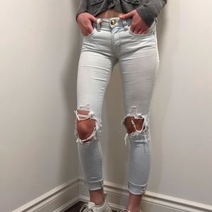 low-rise jeggings with knee rips